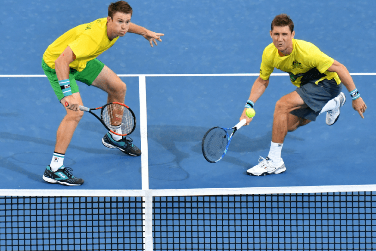 John Peers (left) and Matt Ebden (right) in action during their doubles match against Germany's Jan-Lennard Struff and Tim Puetz. 
