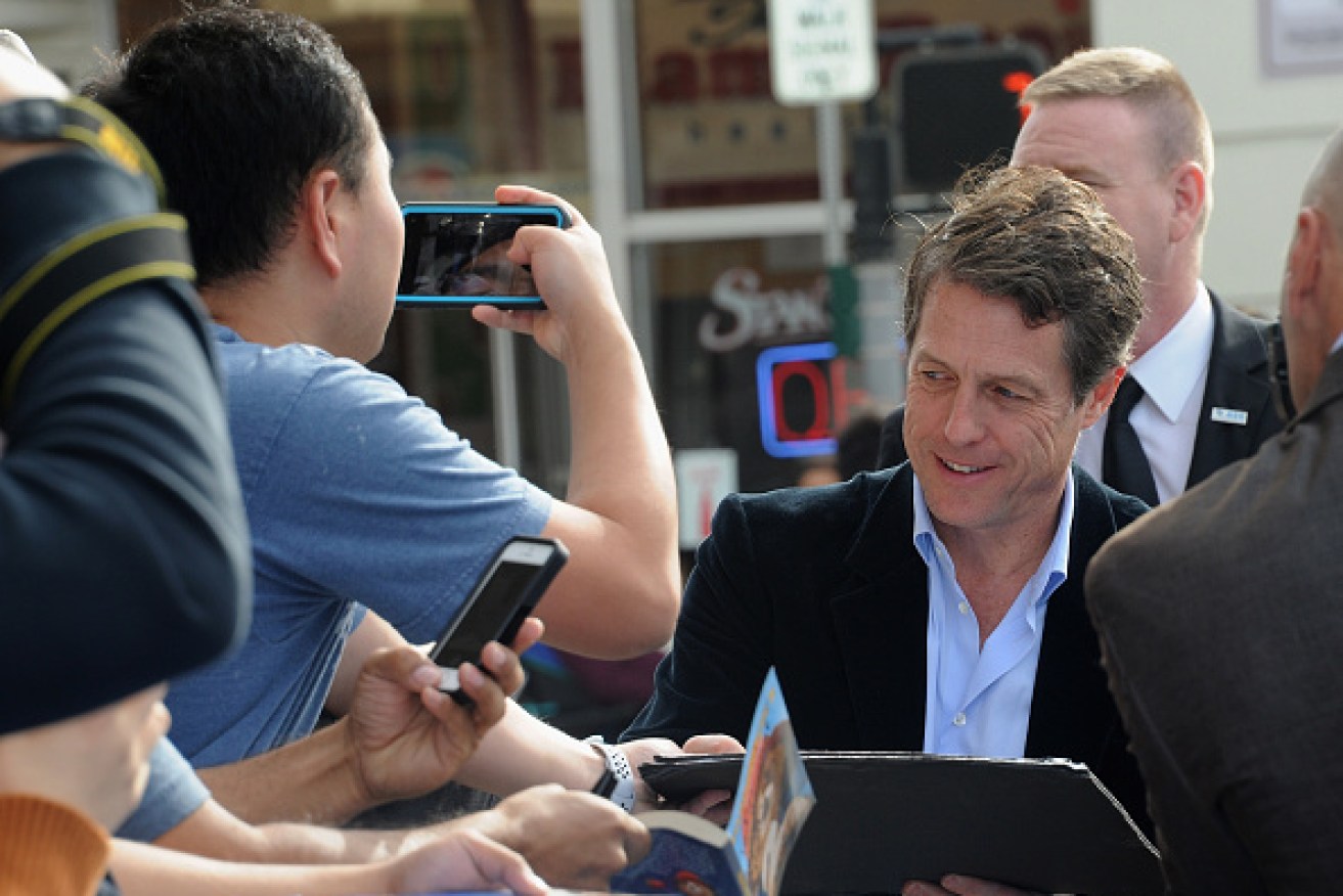 Actor Hugh Grant, at the premiere of Paddington 2, has settled his claim  of phone hacking against Mirror Group Newspapers. 