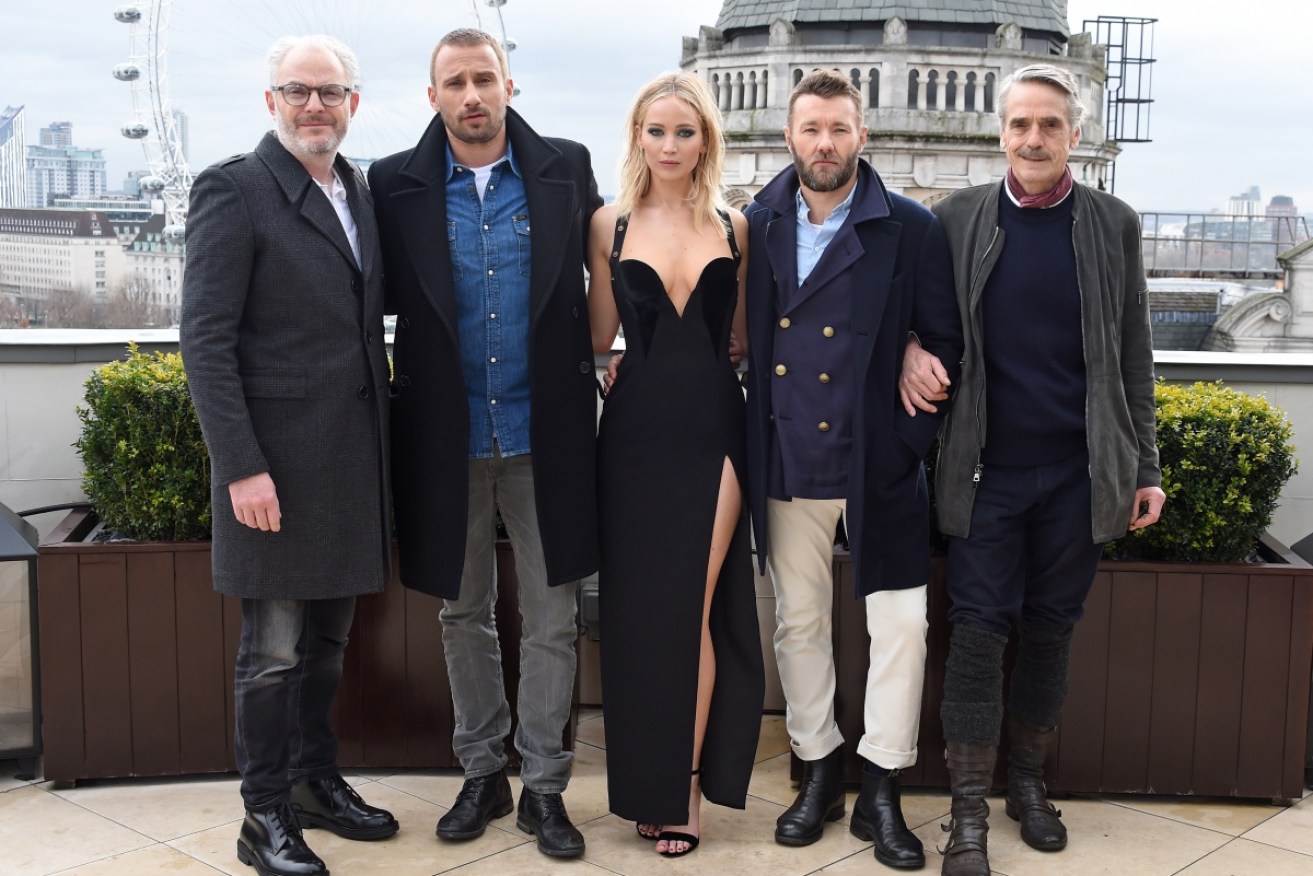 Jennifer Lawrence braved the London cold in Versace, while her male co-stars were all rugged up.