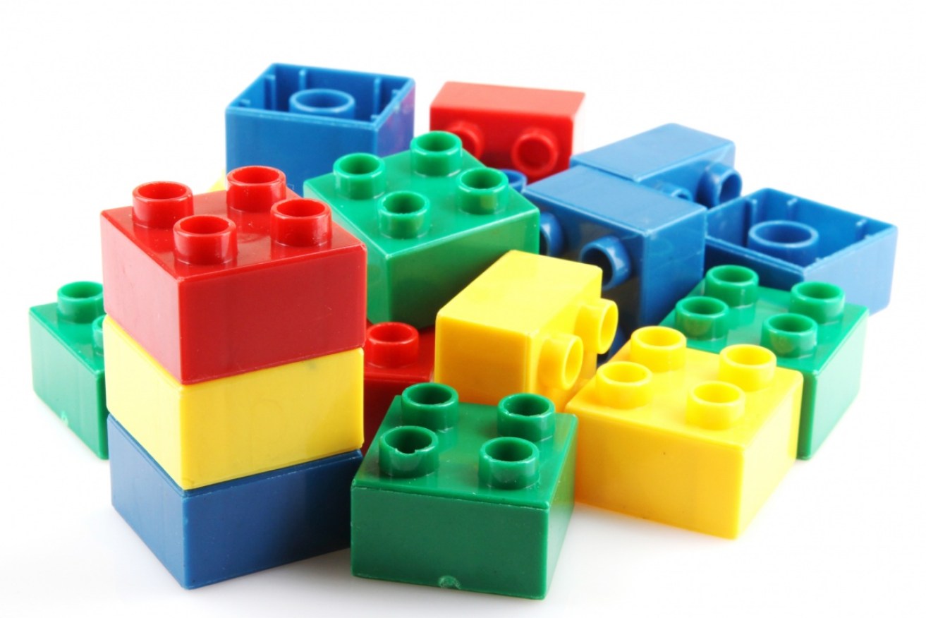 A man and a woman have been charged over the alleged theft of 47 Lego boxes.