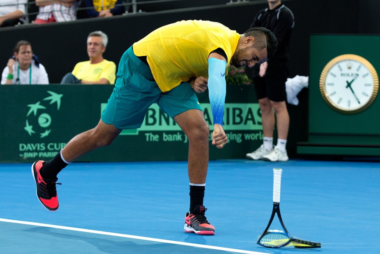 Nick Kyrgios smashes his racquet in the Davis Cup against Germany in early February.