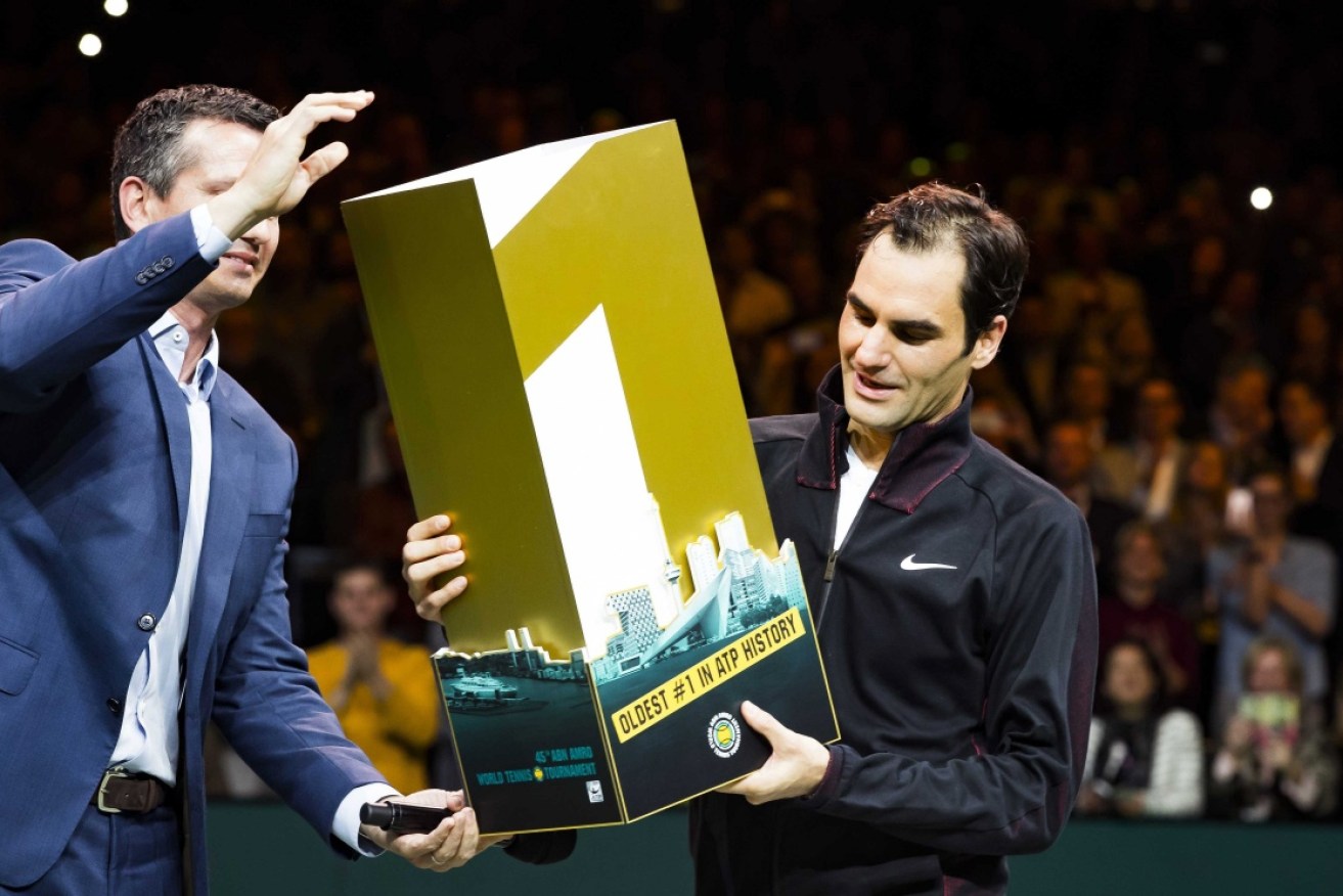 After being handed a huge No.1 shaped plaque on court, Roger Federer said it was a night to remember 'forever'. 
