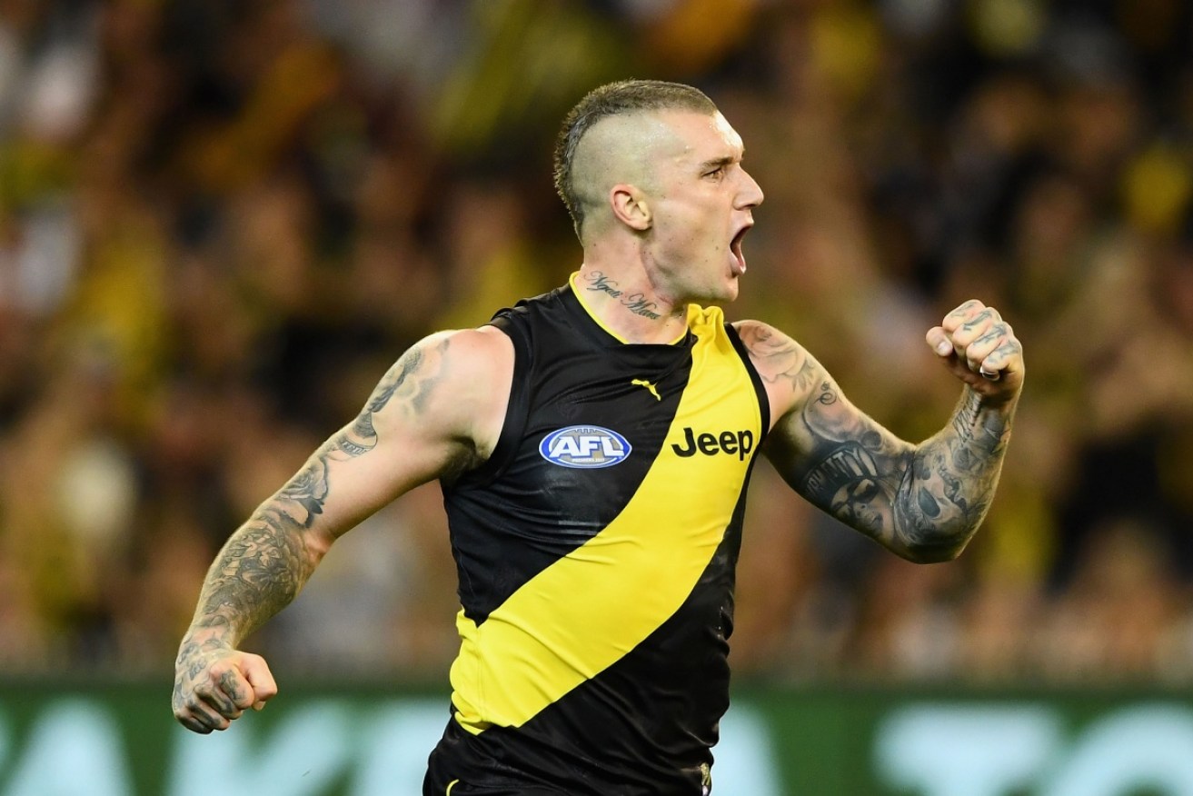 Dustin Martin will travel to New Zealand to see his exiled father for the first time in more than a year.