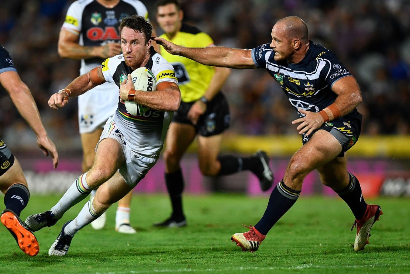 James Maloney heads for the try line during his days with the Panthers.