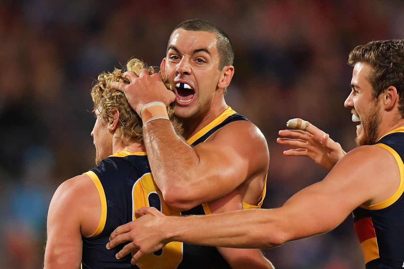 Crows captain Taylor Walker enjoyed some measure of revenge against the Tigers.