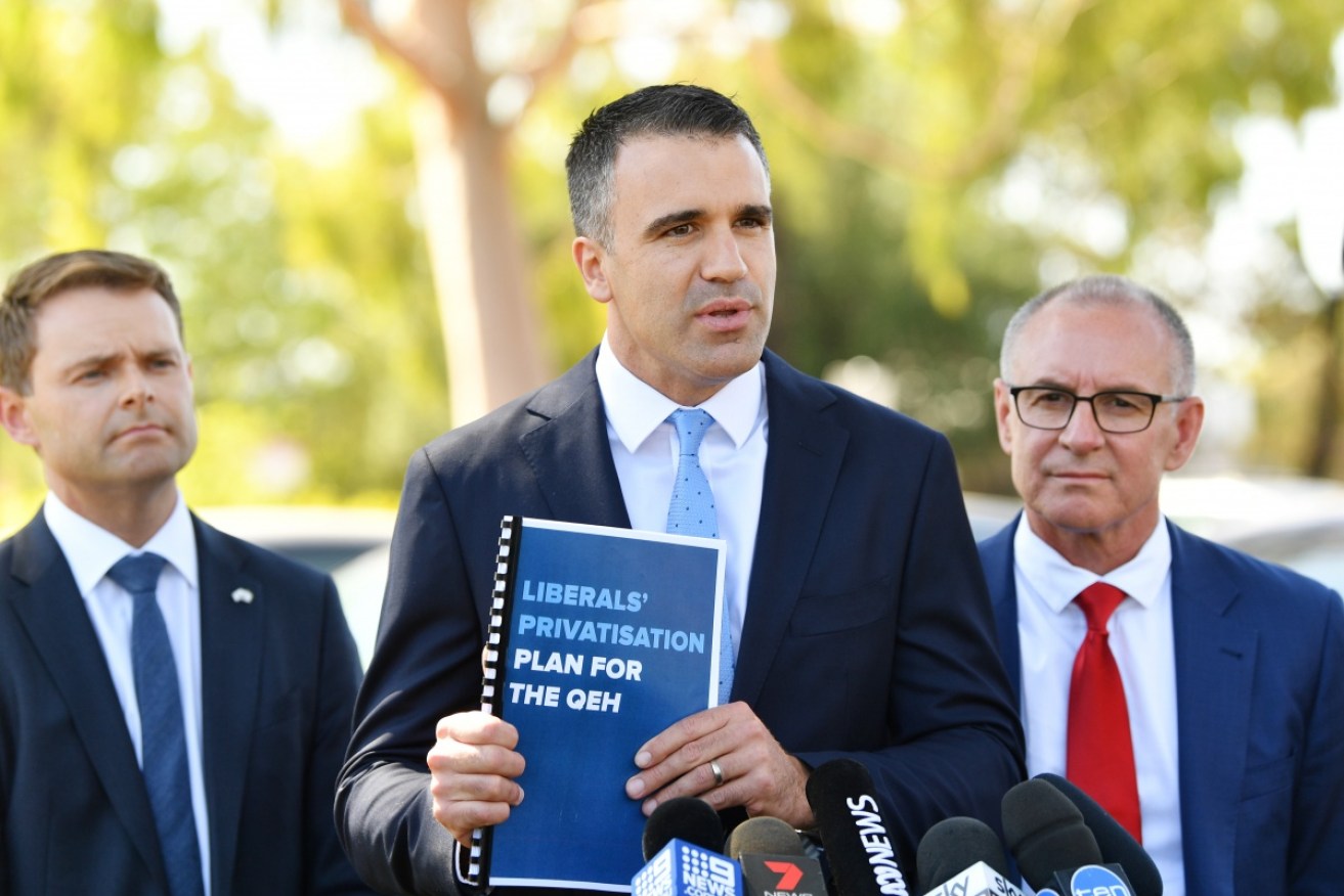 Health Minister Peter Malinauskas (C) during the recent election campaign.
