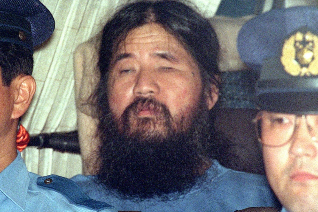 Cult leader Shoko Asahara after a court appearance in 1996.