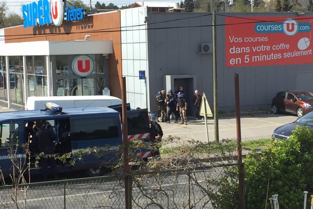 Police respond to a hostage situation at a supermarket in Trebes, France.