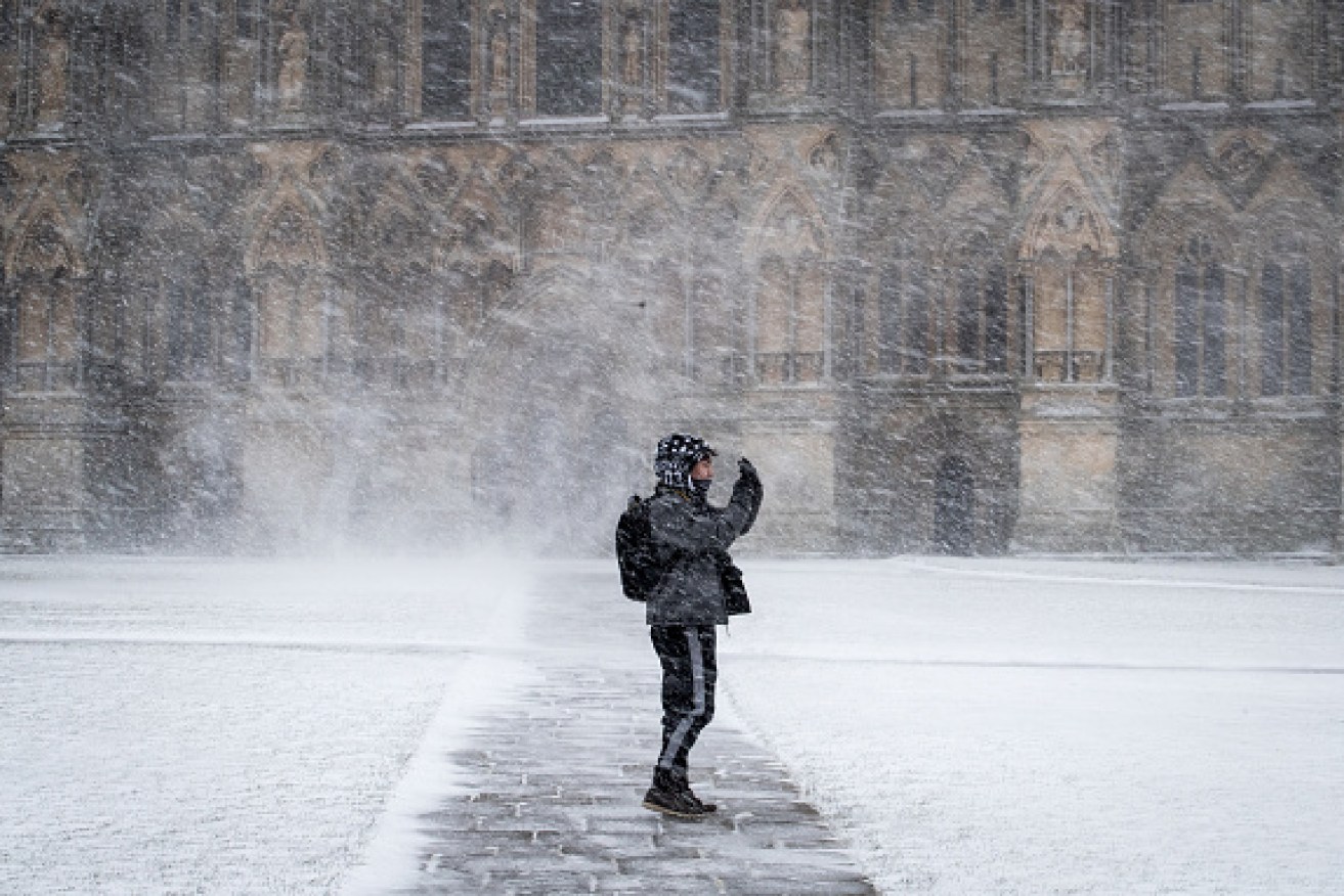 The forecast snow arrives in Wells, England. 