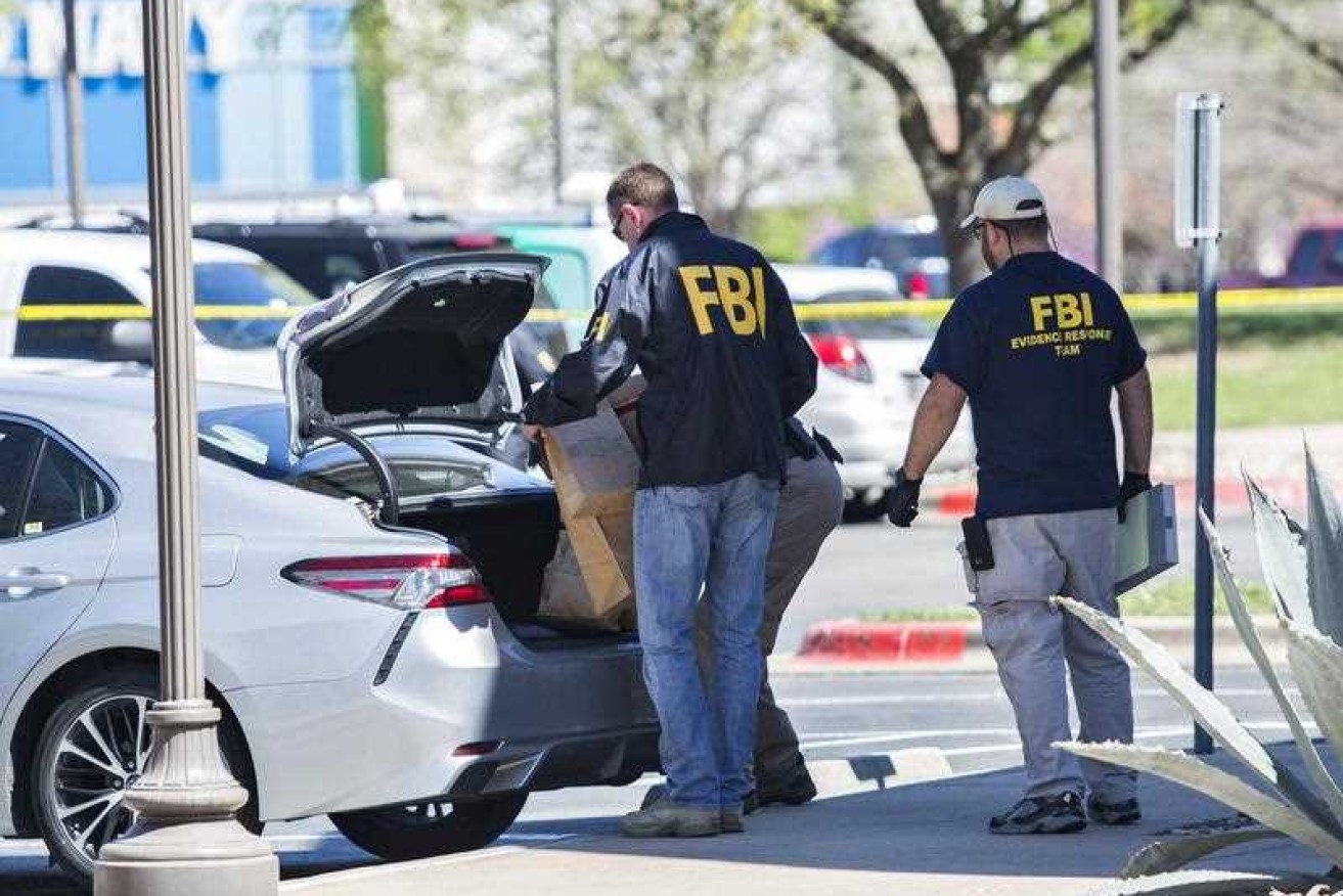 FBI officials at the site of Sunday's deadly explosion in Austin, Texas. 