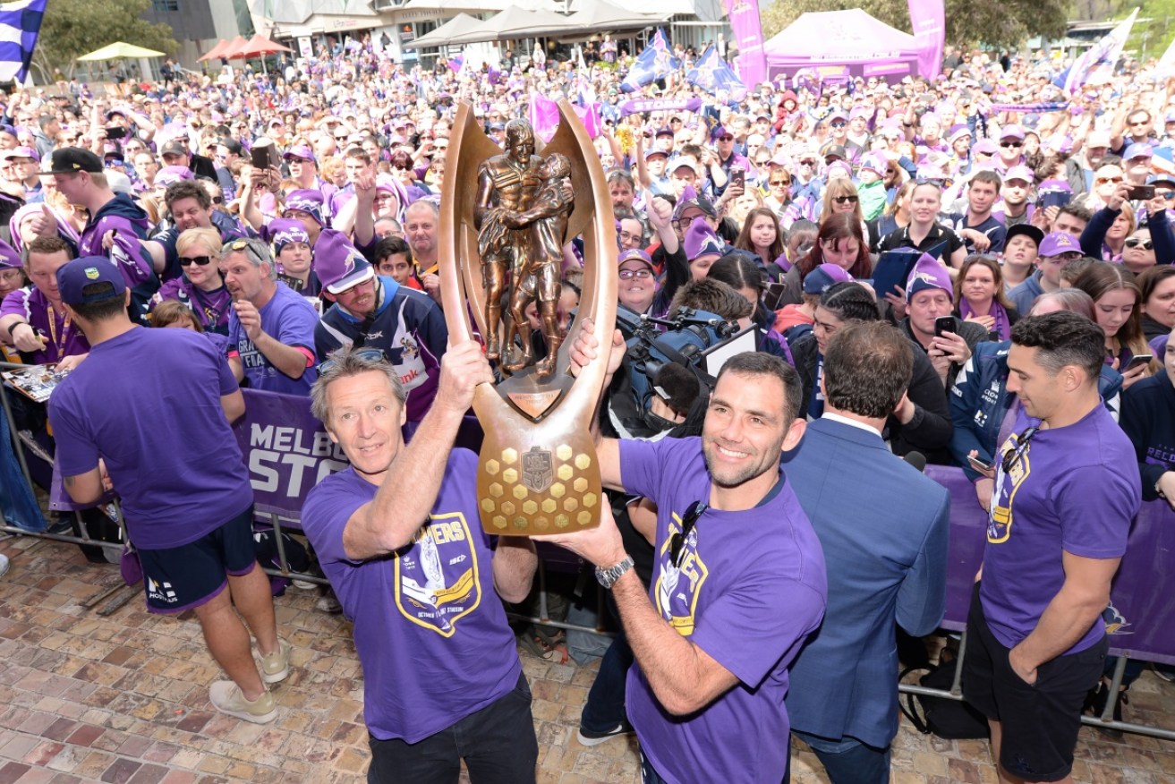 Craig Bellamy and Cameron Smith hold the 2017 trophy aloft. Can they repeat it this year?