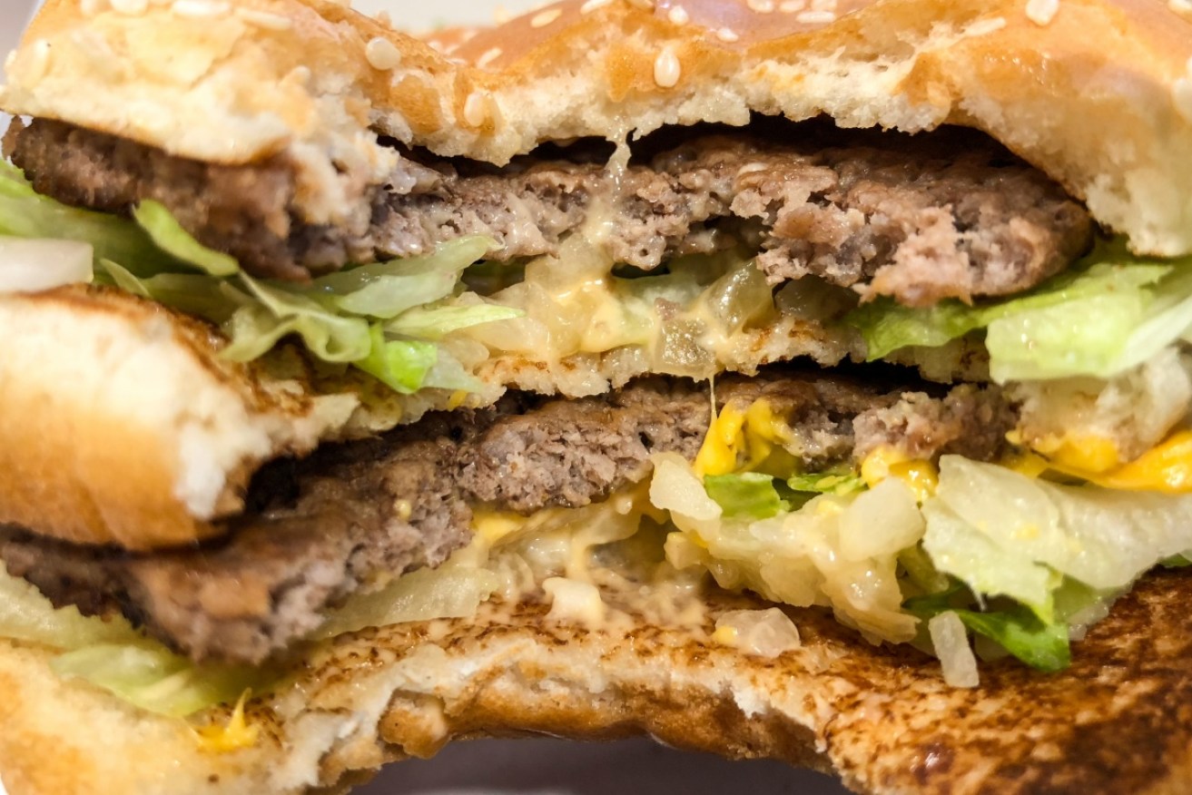 Law changes have done little to make burgers at McDonald's and Hungry Jack's any healthier.