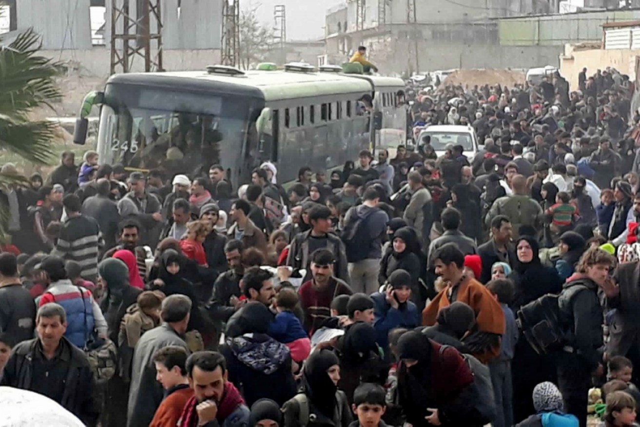 About 12,000 civilians have fled eastern Ghouta as the Syrian army, aided by Russia, pushes to capture the area.