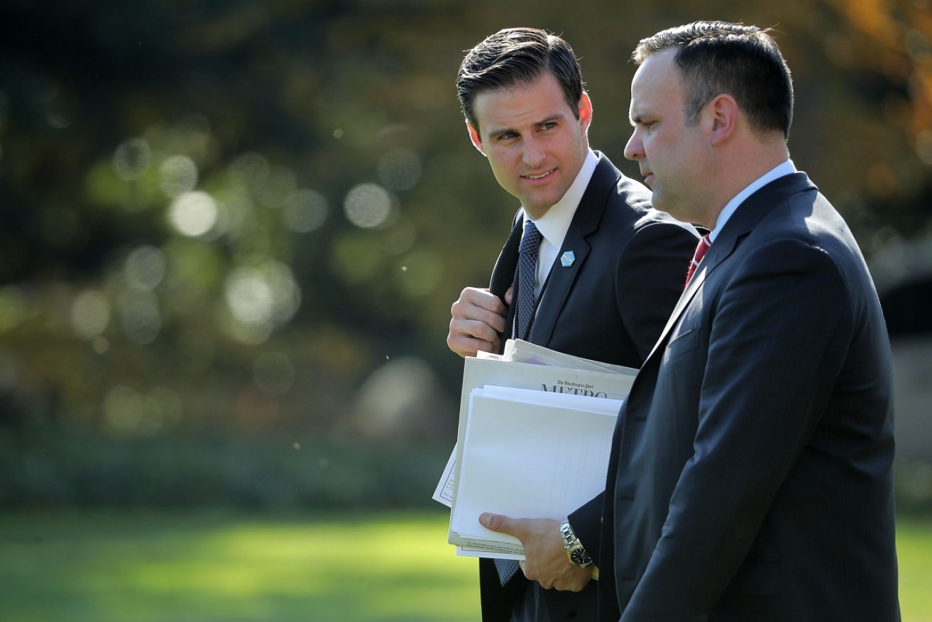 John McEntee (L) has been escorted out of the White House over security clearance issues.