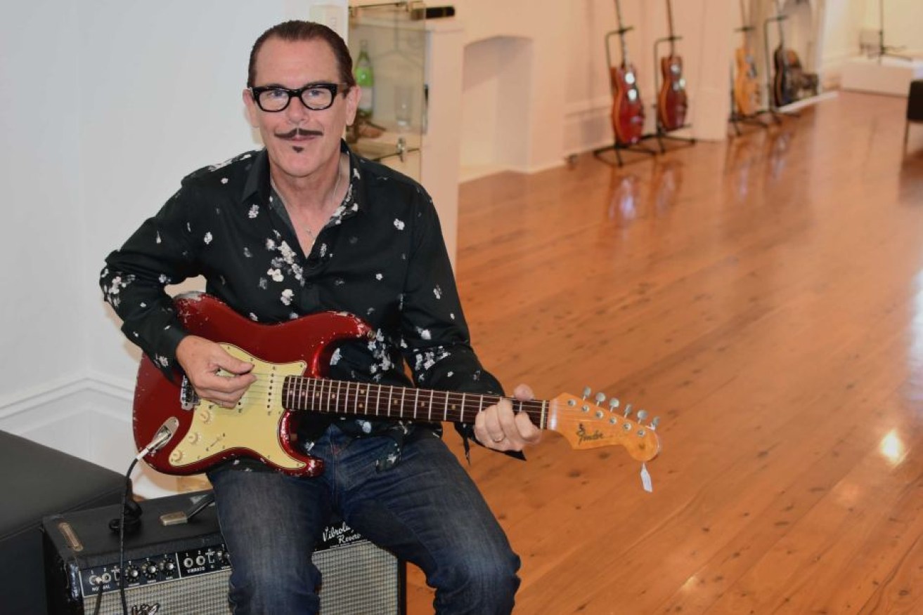 Kirk Pengilly hopes the guitars he is selling are picked up by musicians.