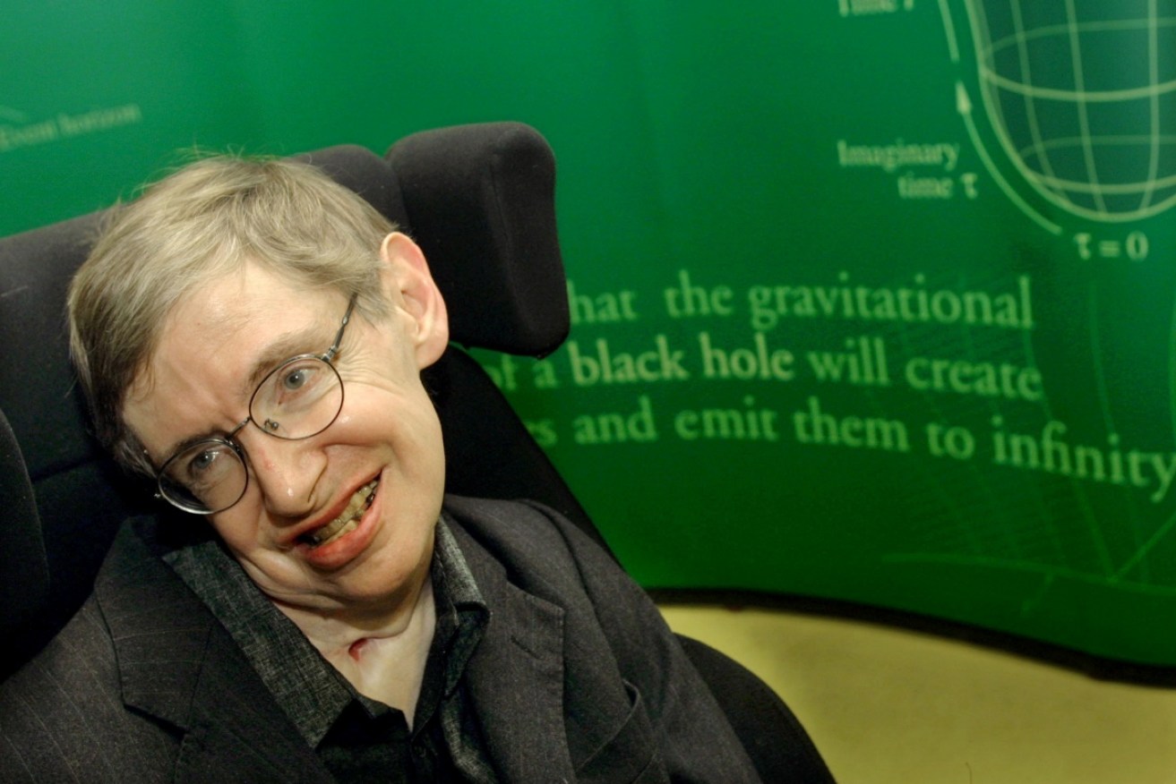 Stephen Hawking celebrates his 60th birthday at the University of Cambridge in 2002.