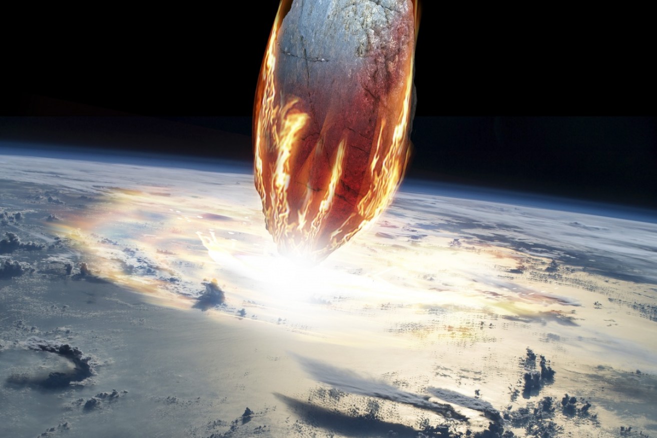 An artist's impression of a large asteroid hitting the Earth's atmosphere.