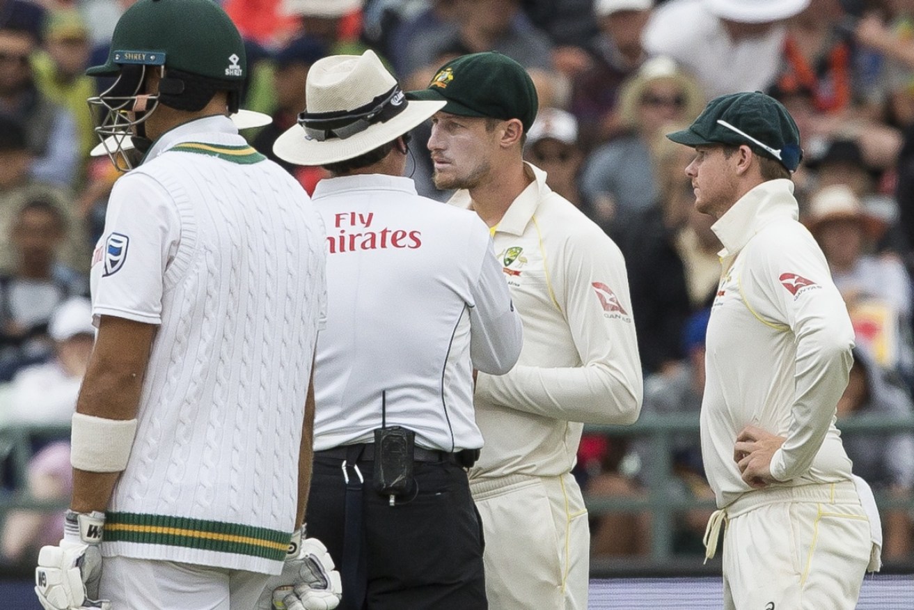 Cameron Bancroft talks to the umpire after the ball tampering was spotted.