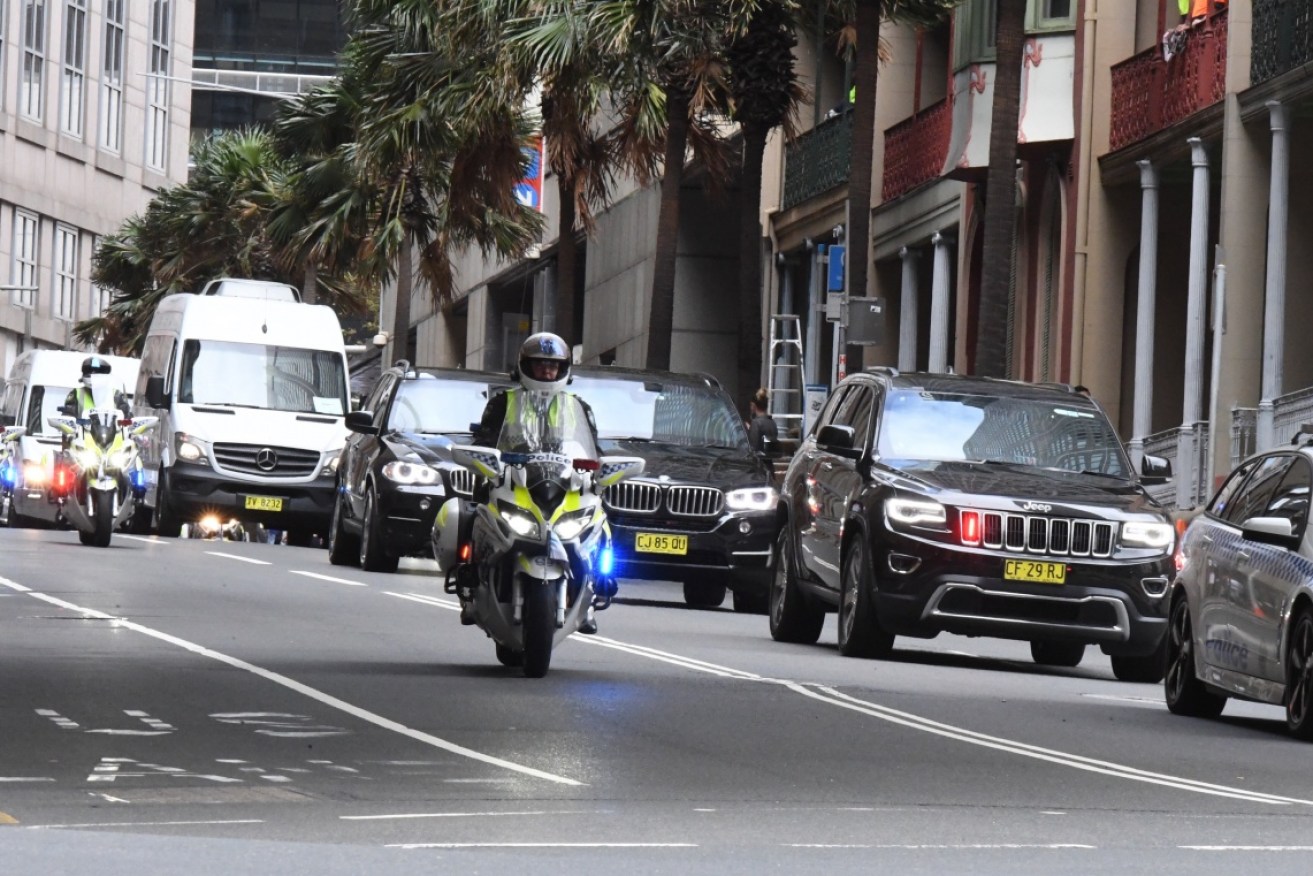 A motorcade of vans, SUVs and a dozen police motorbikes transported Mr Obama from the airport to a hotel in Sydney's CBD.