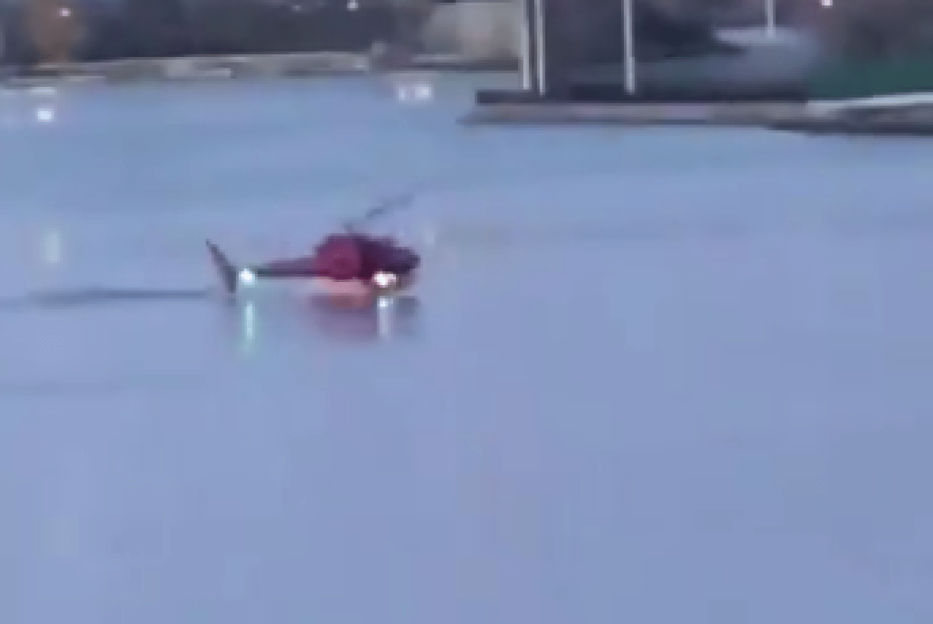 The moment the helicopter hit the water.