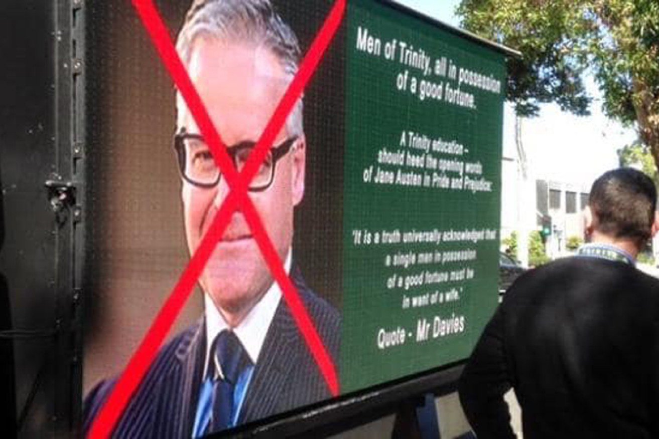 A truck with a billboard criticising headmaster Michael Davies was driven outside the school.