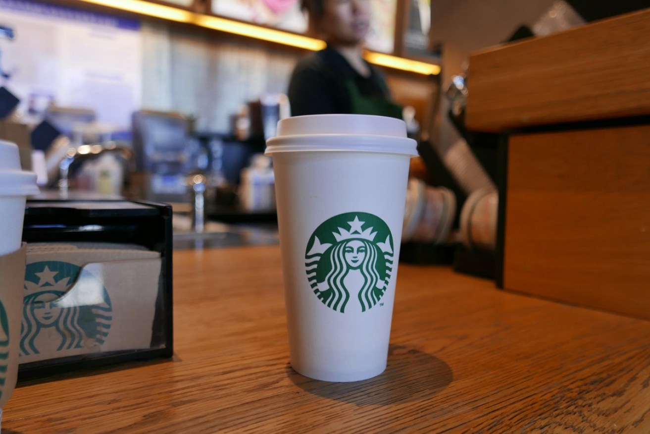Don't bring your cup: Starbucks won't be accepting reusable coffee cups in the US to try and stem the spread of coronavirus.