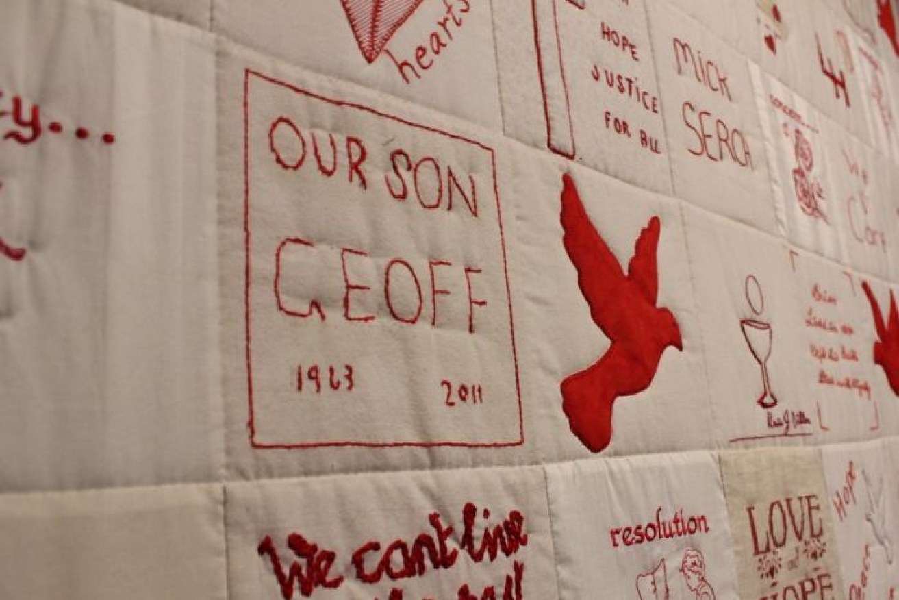 The Quilt of Hope was created by mothers with red doves signifying those lost to suicide. 
