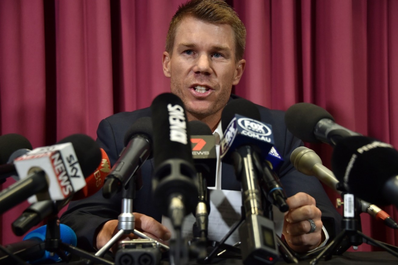 Rehearsing for his close-up? David Warner faces the press on March 31 in Sydney.