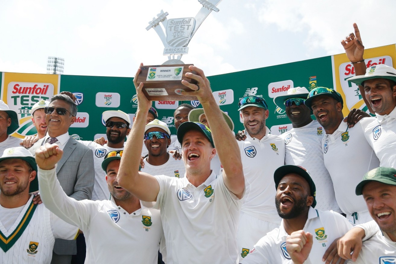 South Africa players celebrate their Test series win over Australia.