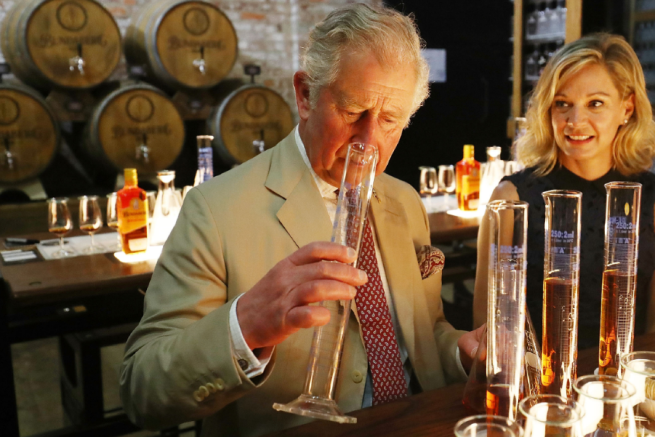 Prince Charles finds  time to sample the wares during a visit to the Bundaberg Rum distillery.