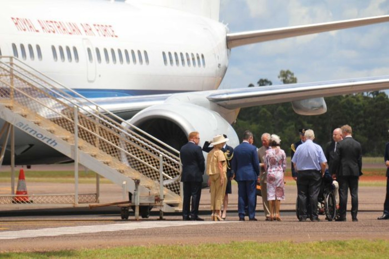Prince Charles shakes hands with Chief Minister Michael Gunner on arrival in the NT. 