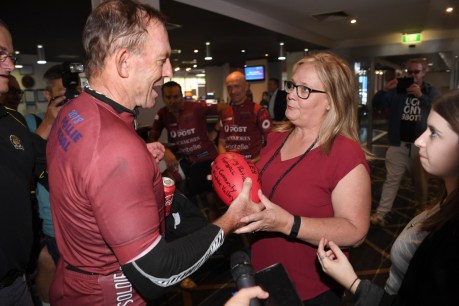Tony Abbott gets &#8216;political football&#8217; in coal town