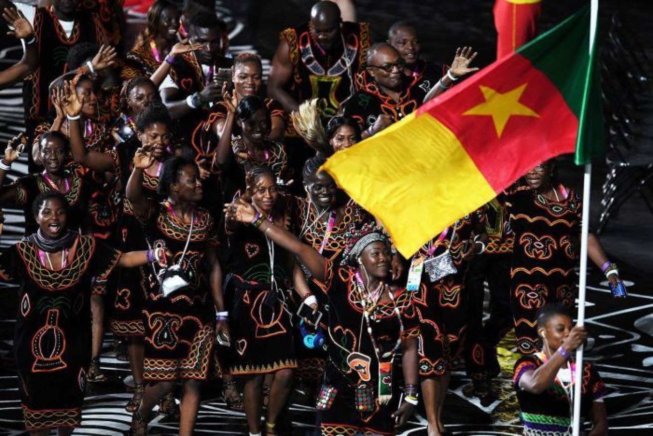 The Cameroon team celebrate during the Gold Coast opening ceremony. 