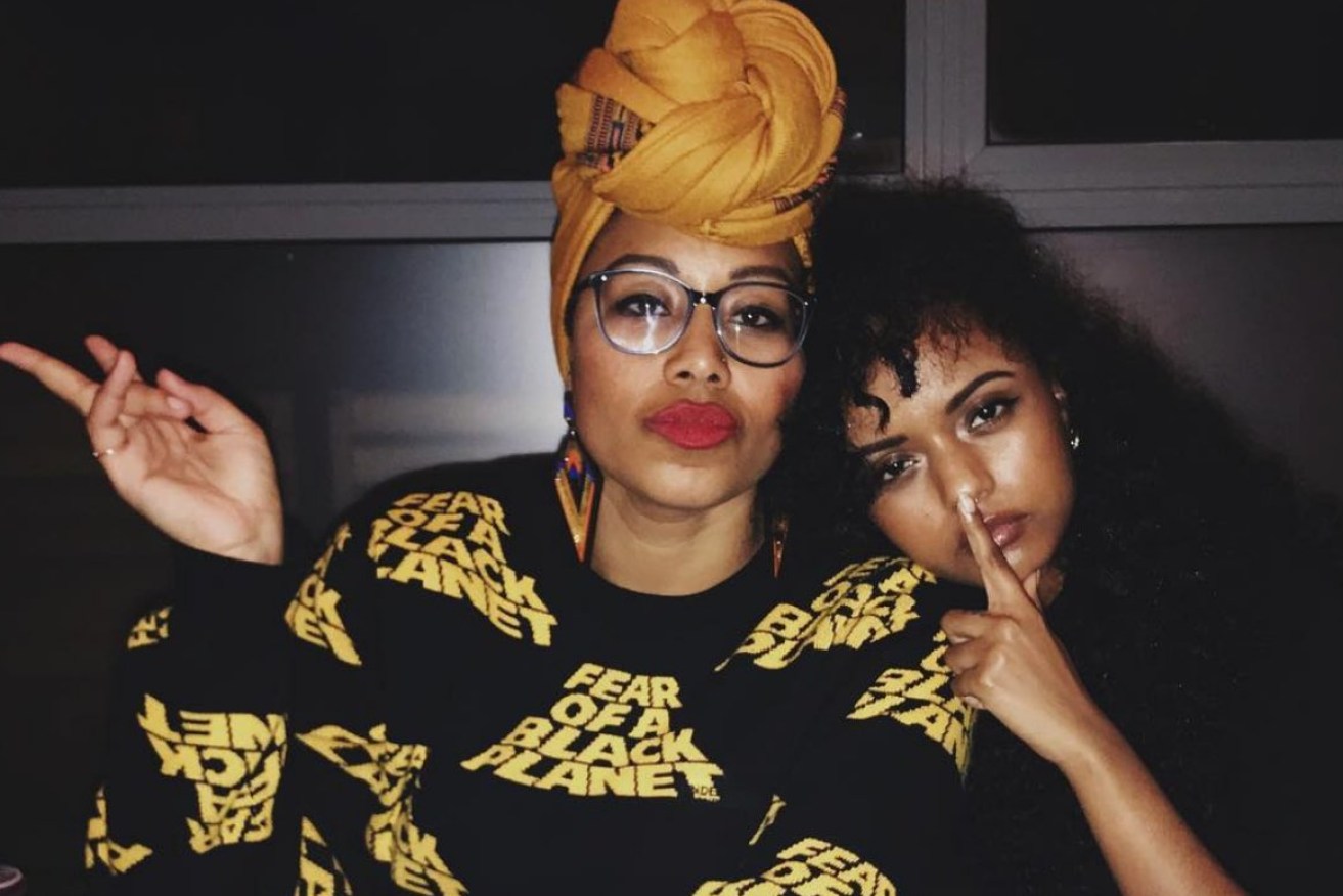 Yassmin Abdel-Magied (left, with a friend) was on a plane home three hours after arriving in the US.