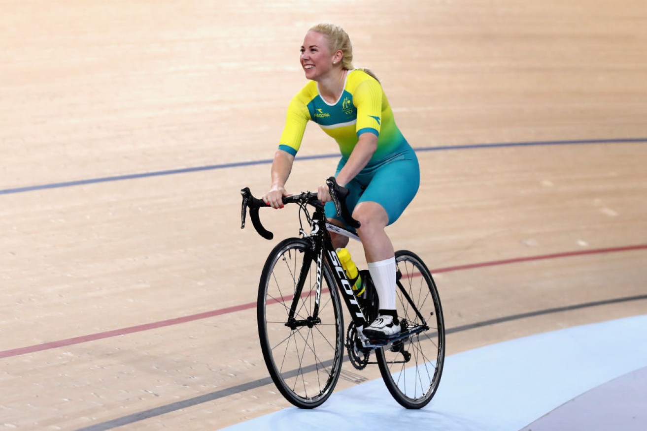 Kaarle McCulloch celebrates winning gold in the Women's 500m Time Trial.
