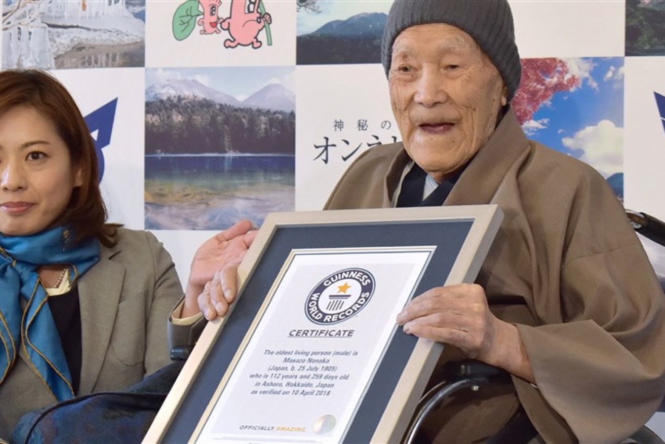 Masazo Nonaka is currently the oldest living man and enjoys watching TV and reading newspapers. Photo: Getty