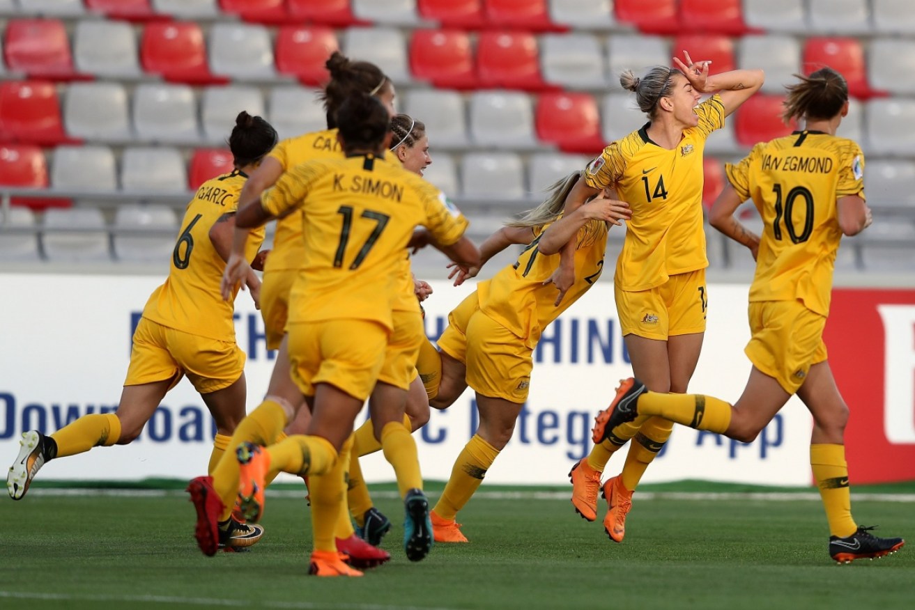 The Matilda's Alanna Kennedy   celebrates scoring Asian Cup semi final between Australia and Thailand.   