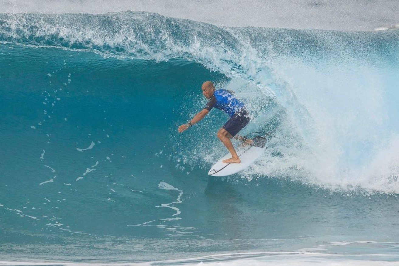 Kelly Slater says the two WA shark attacks on Monday may be a precursor to a "larger issue".