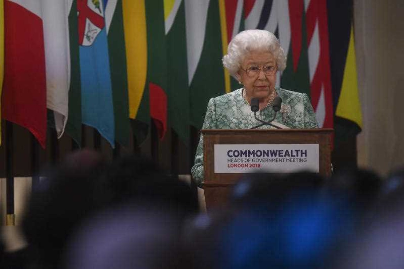 Queen Elizabeth II speaks at the opening of the Commonwealth Heads of Government Meeting at Buckingham Palace.