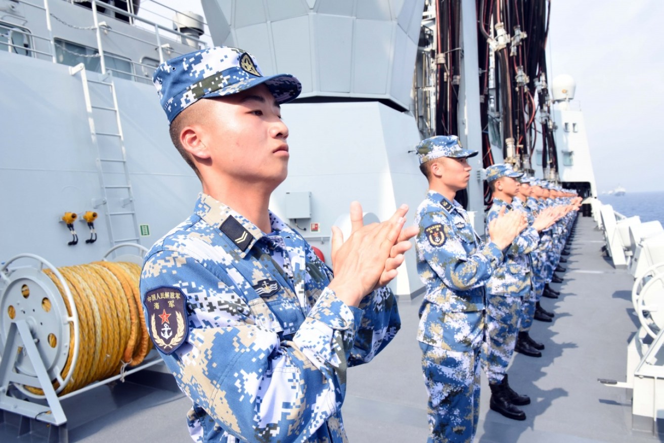 China's is boosting its military and naval might and Australia is responding in kind.