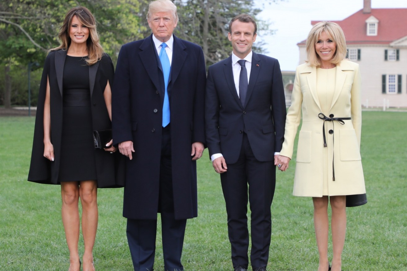 Brigitte Macron (far right) has a natural proclivity for First Lady fashion that's both appropriate and comfortable.