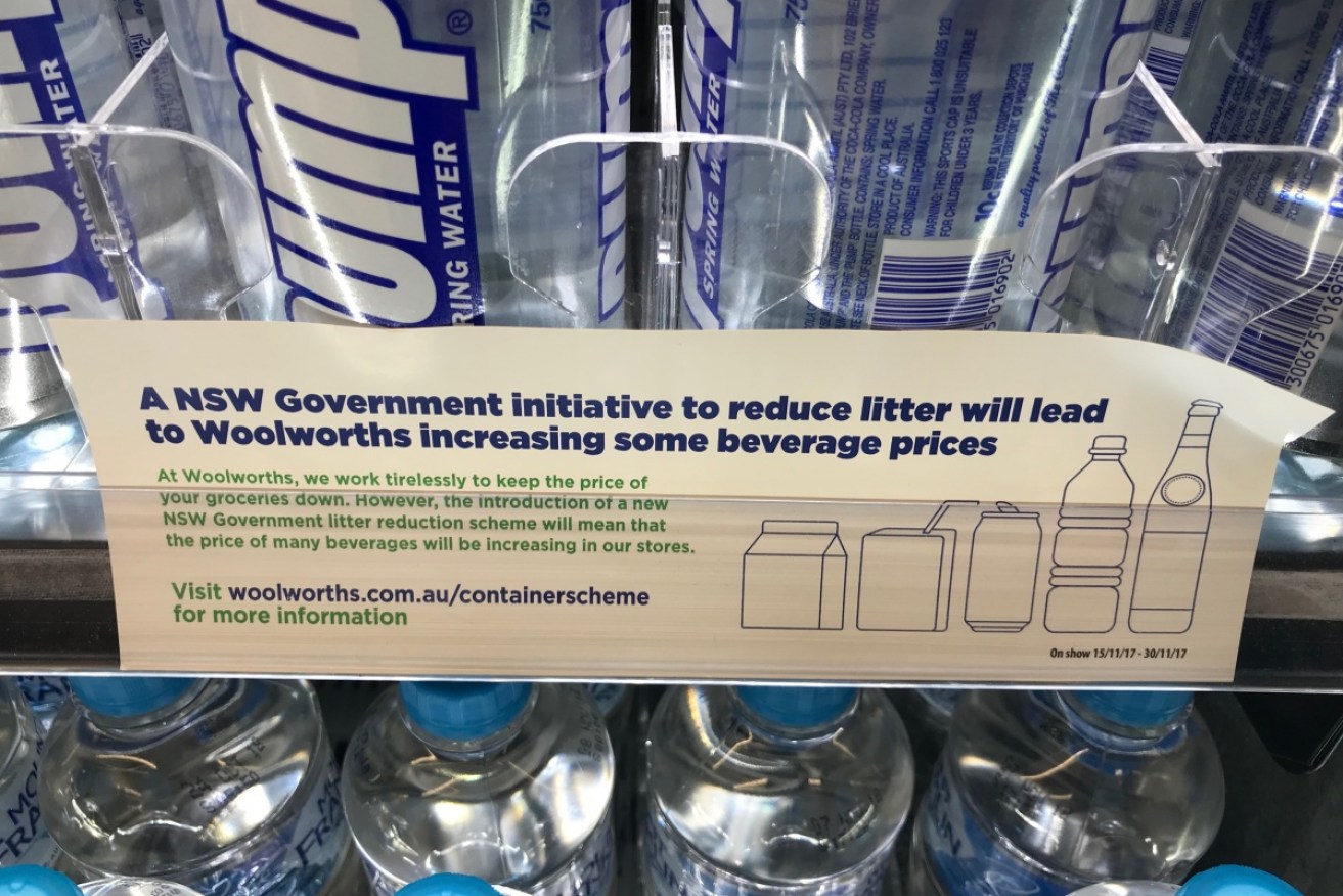 A notice seen across NSW Woolworths supermarkets in November over the "Cash-for-Cans" scheme.