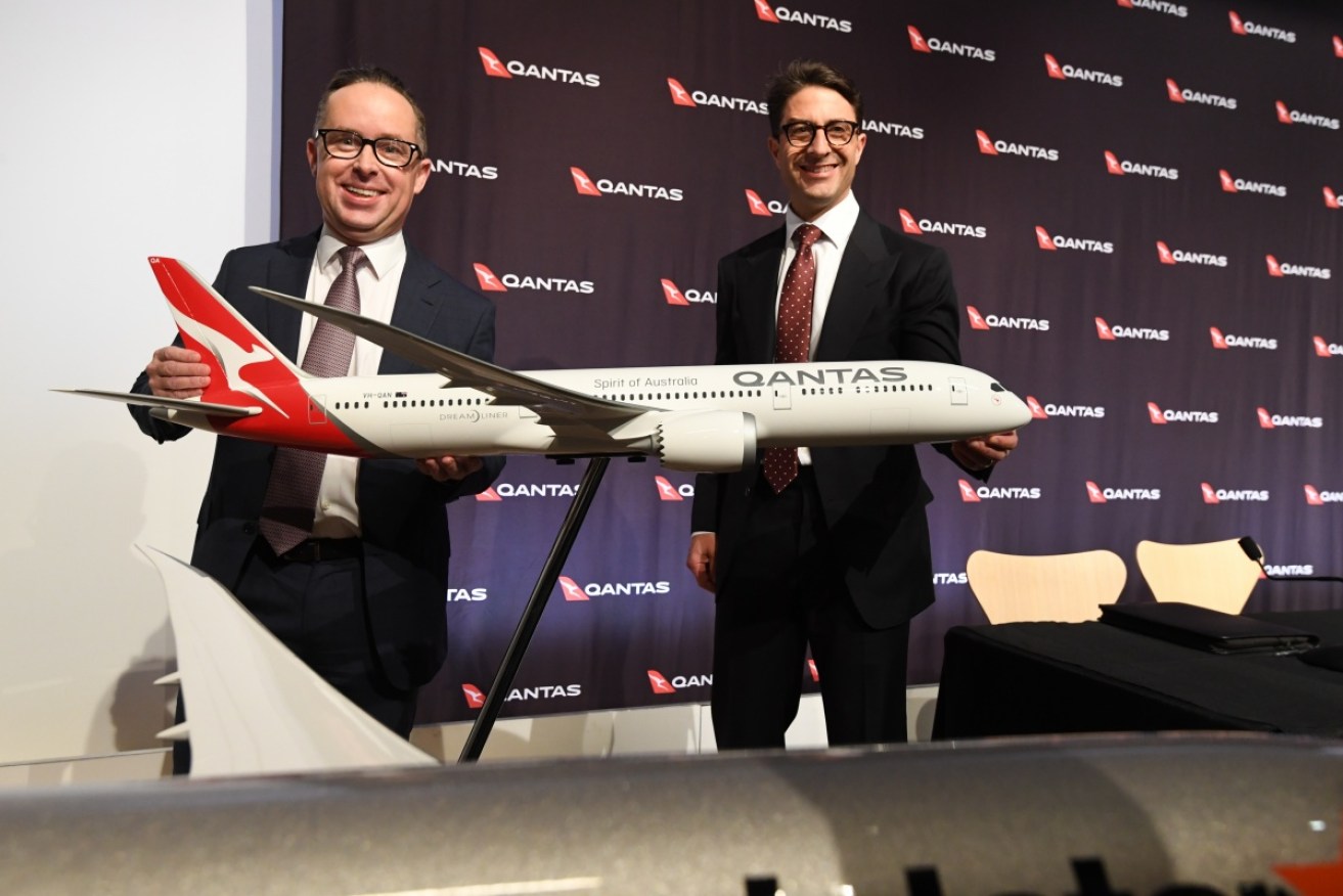 Qantas' chief financial officer Tino La Spina (right) was one of the executives at the hearing.