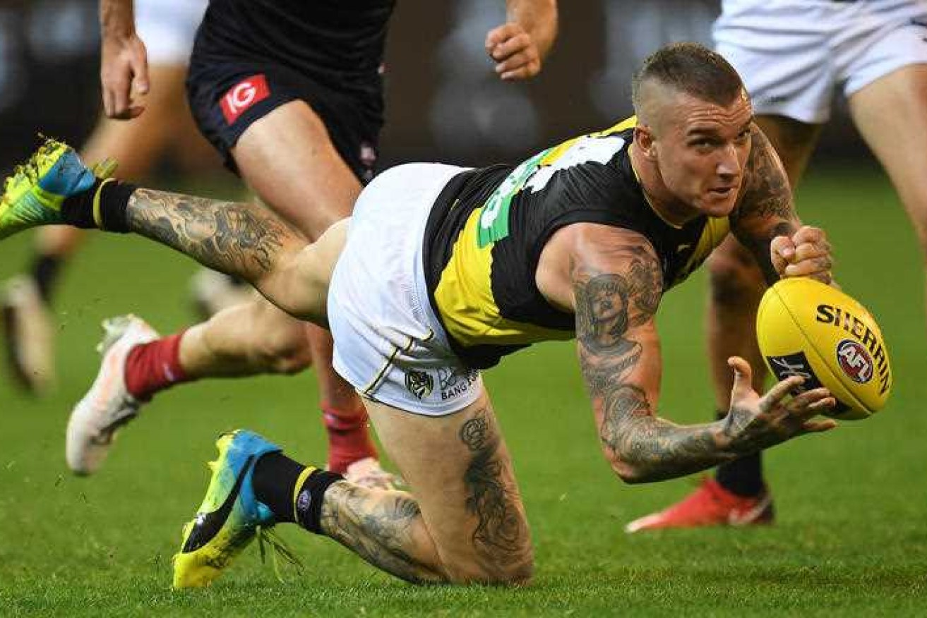 Dustin Martin and the Tigers put in a big second half to overrun the Demons.