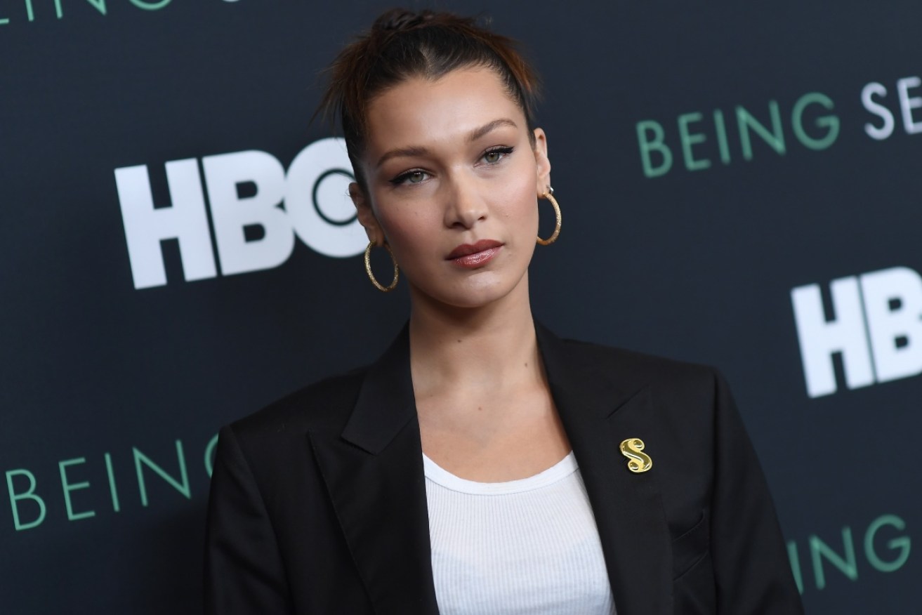 Model Bella Hadid looked great (if a tad morose) above the waist at <i>Being Serena</i> on April 25. 