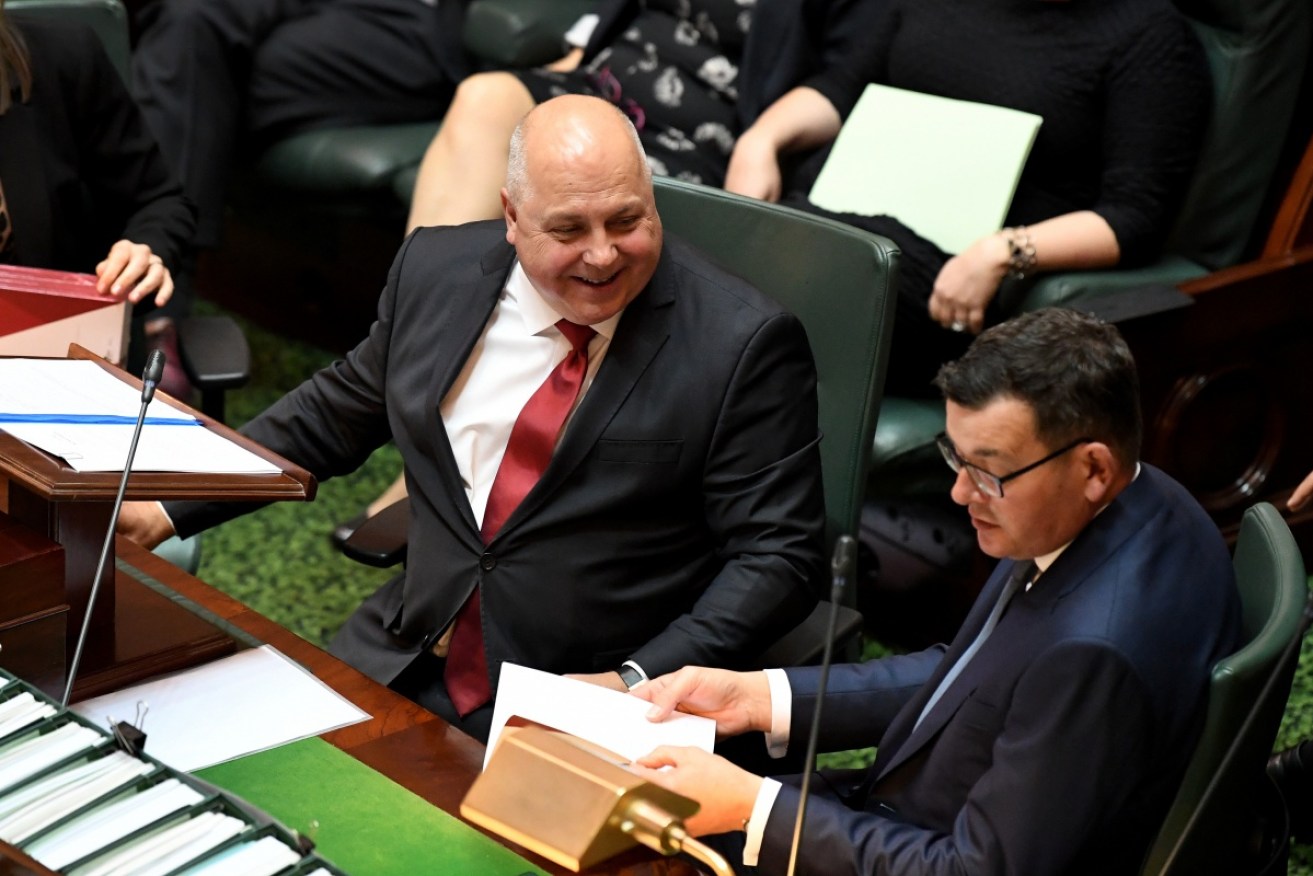 Treasurer Tim Pallas and Premier Daniel Andrews are pictured during the budget speech on Tuesday.