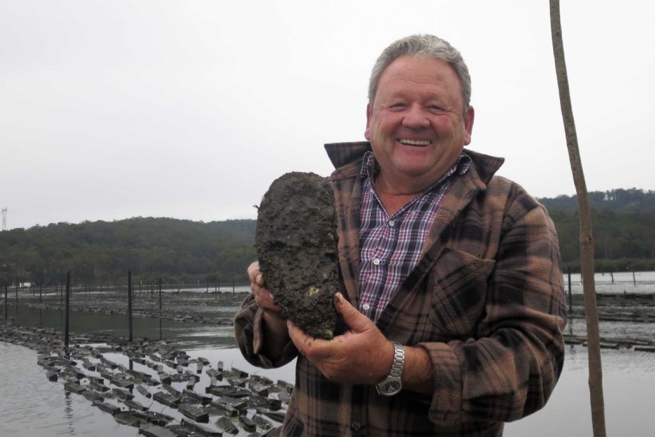 Clyde River oyster grower, Bernie Connell with his giant oyster named Jack.