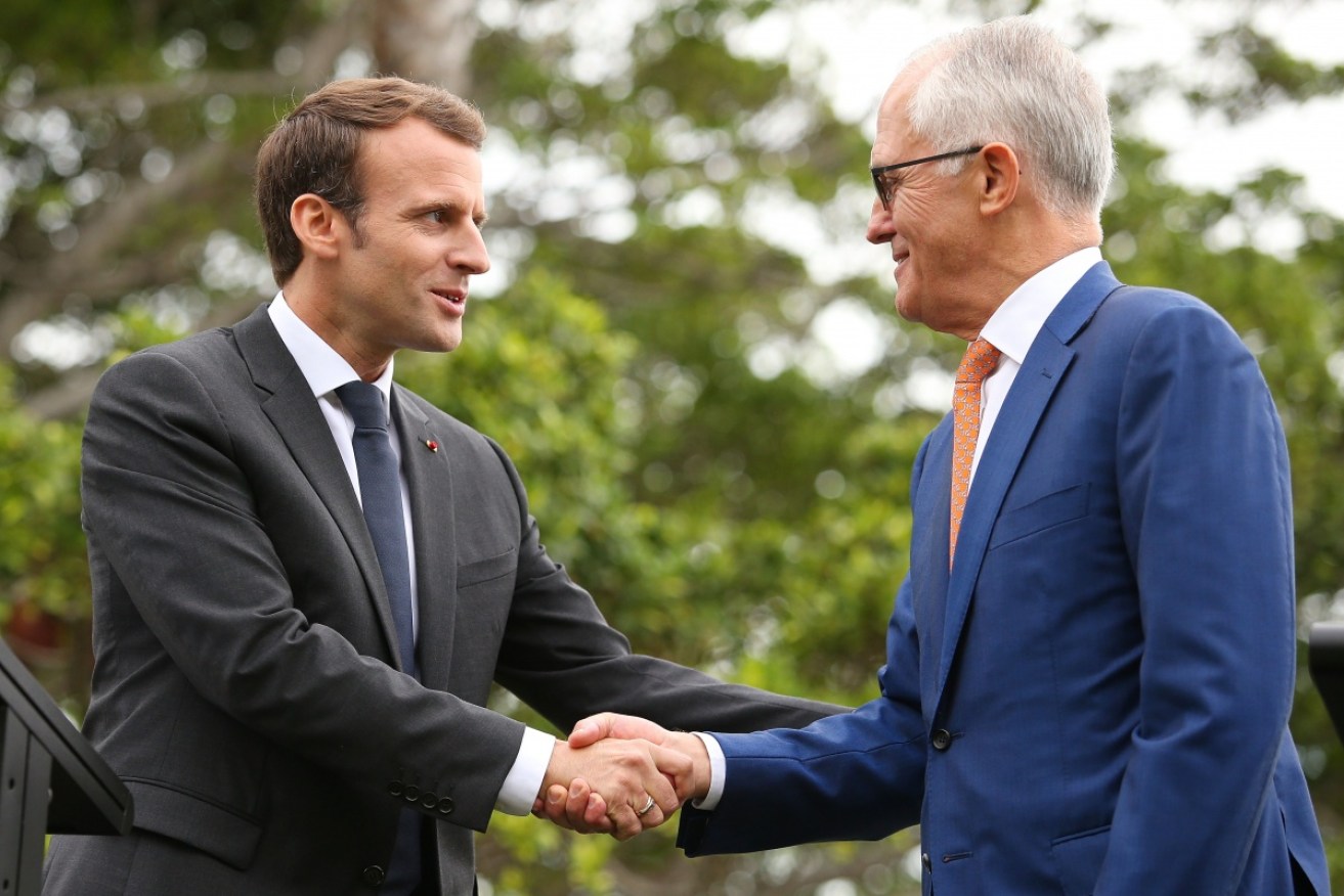 French President Emmanuel Macron  (L) and Australian PM Malcolm Turnbull in Sydney yesterday. 