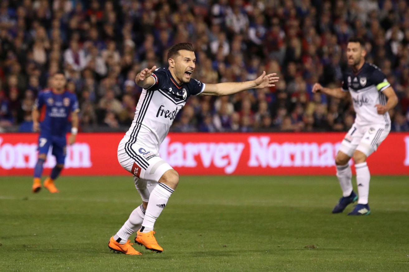 Kosta Barbarouses, of the Victory, celebrates his goal during the 2018 A-League Grand Final.
