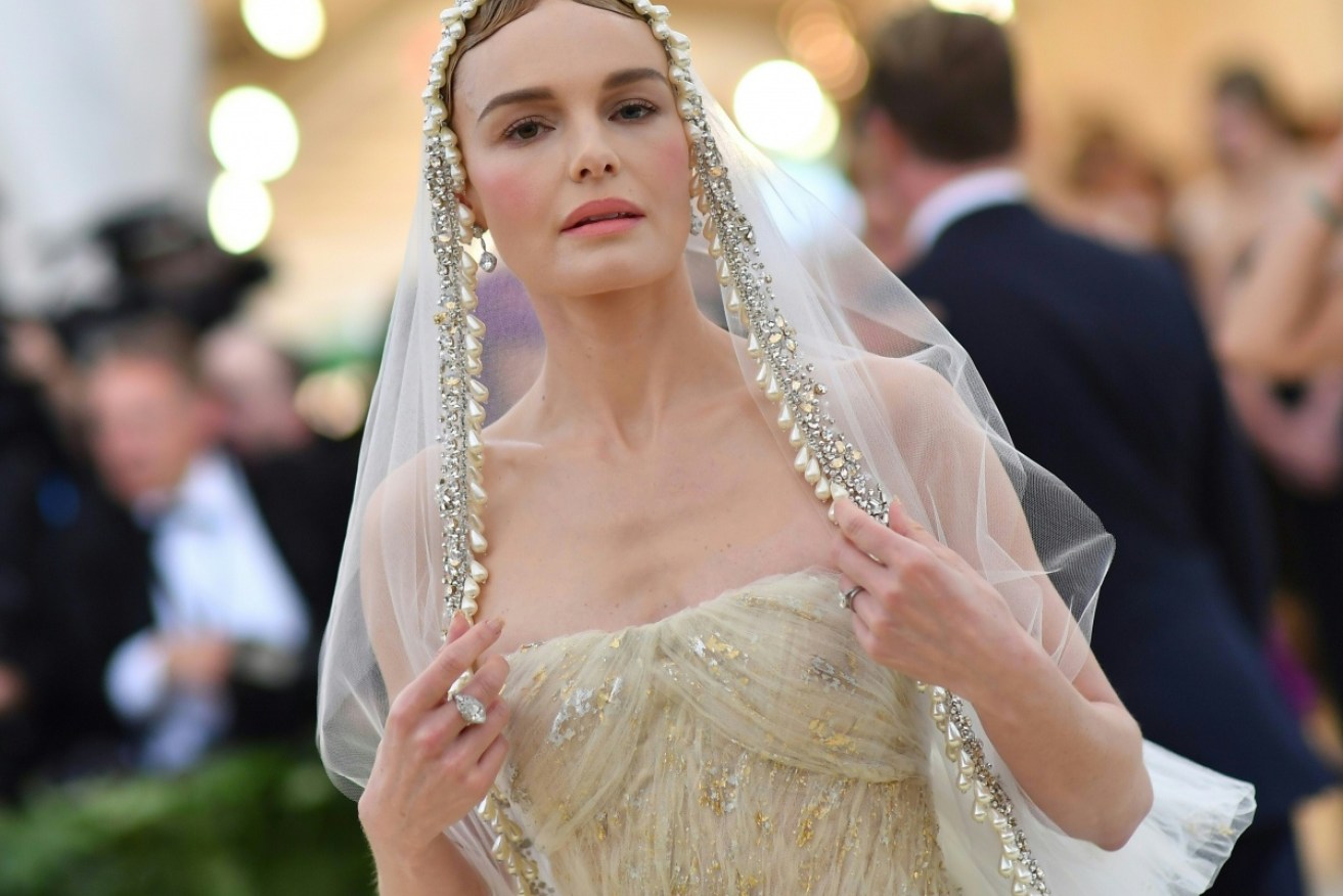 Kate Bosworth paid homage to the Met Gala theme as an ethereal Catholic bride.